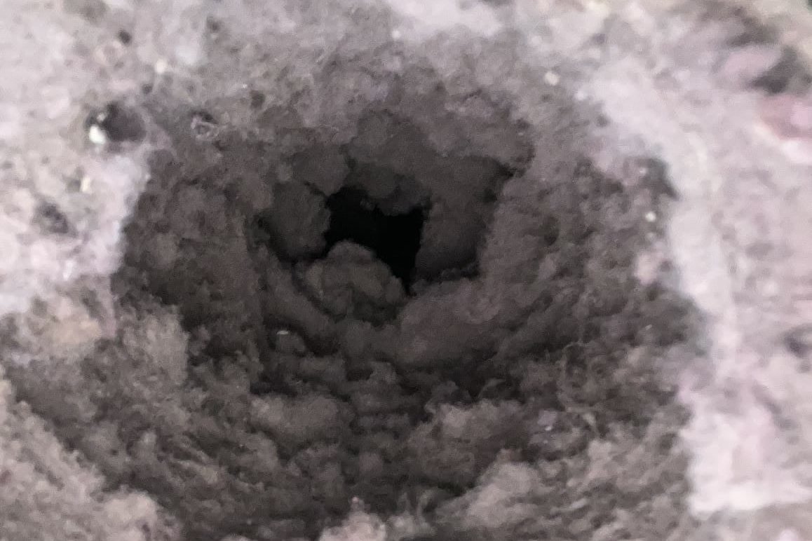 Dryer vent duct clogged with lint before cleaning